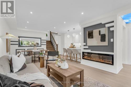 61 Sundial Crescent, Toronto, ON - Indoor Photo Showing Living Room With Fireplace