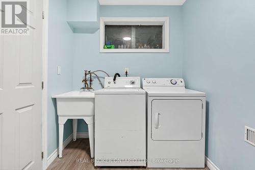 Utility sink, wall-mounted faucet, wood-finish - 312 Old Guelph Road, Hamilton, ON 