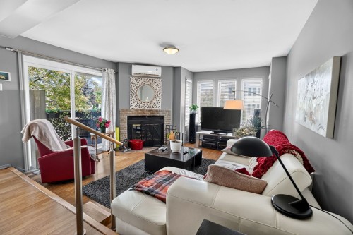 Living Room - 21-1030 Boul. Iberville, Repentigny (Repentigny), QC - Indoor Photo Showing Living Room With Fireplace