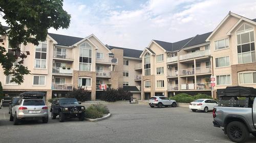 310-400 Sutton Crescent, Kelowna, BC - Outdoor With Balcony With Facade