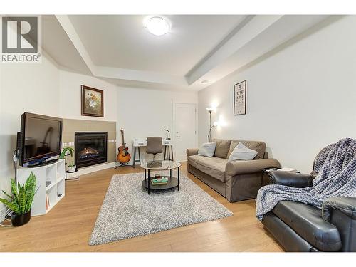 1788 Shayler Place, Kelowna, BC - Indoor Photo Showing Living Room With Fireplace