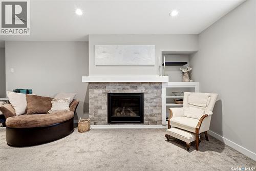 5565 Norseman Crescent, Regina, SK - Indoor Photo Showing Living Room With Fireplace