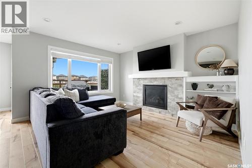 5565 Norseman Crescent, Regina, SK - Indoor Photo Showing Living Room With Fireplace