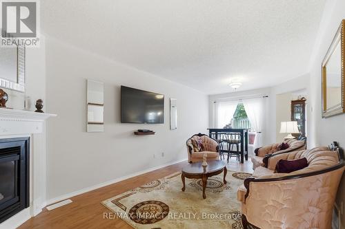 106 Mcfeeters Crescent, Clarington, ON - Indoor Photo Showing Living Room With Fireplace