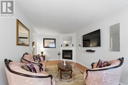106 Mcfeeters Crescent, Clarington, ON - Indoor Photo Showing Living Room With Fireplace