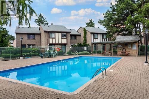 93 - 100 Burrows Hall Boulevard, Toronto, ON - Outdoor With In Ground Pool