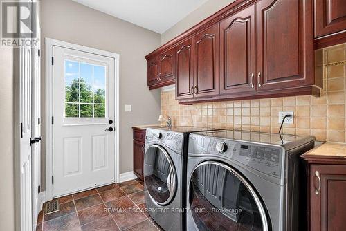 Laundry and walk-out to the new back deck - 110 Concession 11 Road E, Hamilton, ON - Indoor Photo Showing Laundry Room