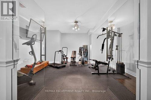 ...Gym with double glass doors, shows rubber mats - 110 Concession 11 Road E, Hamilton, ON - Indoor Photo Showing Gym Room