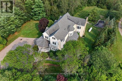 Aerial view shows the lawn area and parking pad - 110 Concession 11 Road E, Hamilton, ON - Outdoor