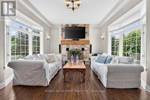 Family Room with double bay windows and fireplace - 110 Concession 11 Road E, Hamilton, ON - Indoor Photo Showing Living Room With Fireplace