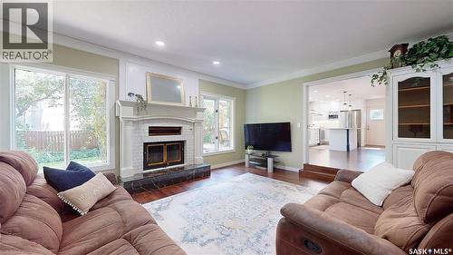 2210 Hanover Crescent E, Regina, SK - Indoor Photo Showing Living Room With Fireplace