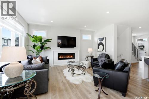 246 Prasad Manor, Saskatoon, SK - Indoor Photo Showing Living Room With Fireplace
