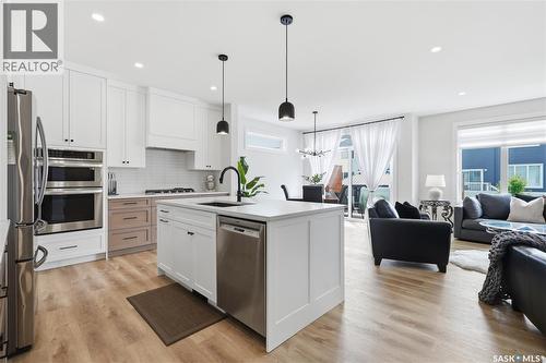 246 Prasad Manor, Saskatoon, SK - Indoor Photo Showing Kitchen With Stainless Steel Kitchen With Upgraded Kitchen