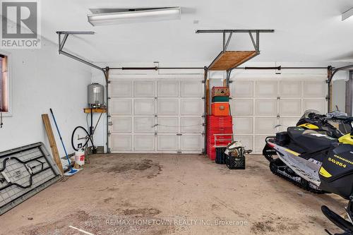 2 automatic doors with 2 manual garage doors - 116 Mill Creek Drive, Rideau Lakes, ON 