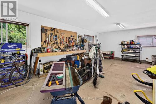Workshop table, plenty of room for DIY enthusiasts - 116 Mill Creek Drive, Rideau Lakes, ON 