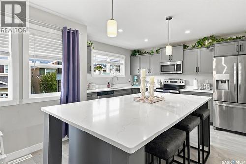 130 315 Dickson Crescent, Saskatoon, SK - Indoor Photo Showing Kitchen With Stainless Steel Kitchen With Upgraded Kitchen