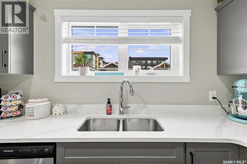 130 315 Dickson Crescent, Saskatoon, SK - Indoor Photo Showing Kitchen With Double Sink