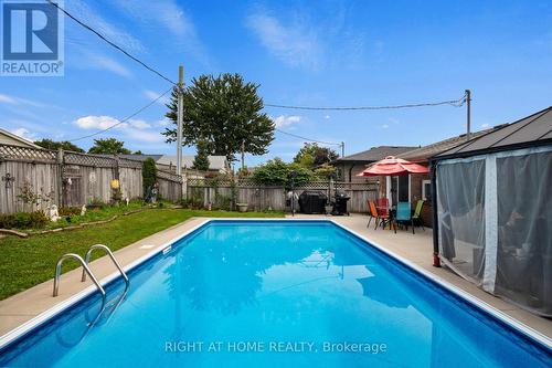 7 Raven Avenue, St. Thomas, ON - Outdoor With In Ground Pool With Backyard