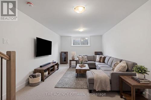 Vitually Staged with furniture - 1202 Spoor Street, Ottawa, ON - Indoor Photo Showing Living Room