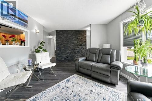 2010 37Th Street W, Saskatoon, SK - Indoor Photo Showing Living Room With Fireplace