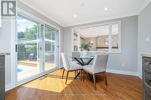 1677 Sherwood Forrest Circle, Mississauga, ON - Indoor Photo Showing Dining Room With Fireplace