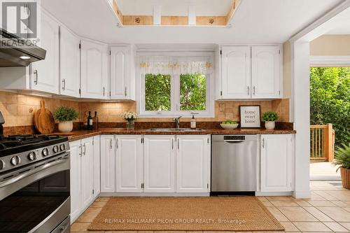 Virtually Staged - 182 Twyford Street, Ottawa, ON - Indoor Photo Showing Kitchen With Double Sink
