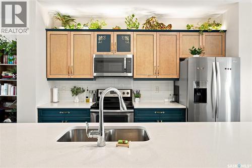 255 Newton Link, Saskatoon, SK - Indoor Photo Showing Kitchen With Double Sink