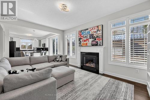 75 Mclarty Gate, Aurora, ON - Indoor Photo Showing Living Room With Fireplace