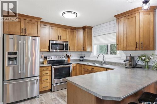151 Makaroff Road, Saskatoon, SK - Indoor Photo Showing Kitchen With Stainless Steel Kitchen With Double Sink