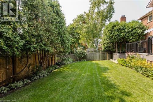 Expansive lawn area bordered by mature trees and shrubs - 1238 Sable Drive, Burlington, ON - Outdoor