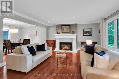 861 Dunlevie Avenue, Ottawa, ON - Indoor Photo Showing Living Room With Fireplace