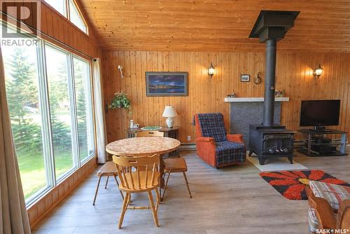 303 Christel Crescent, Lac Des Îles, SK - Indoor With Fireplace