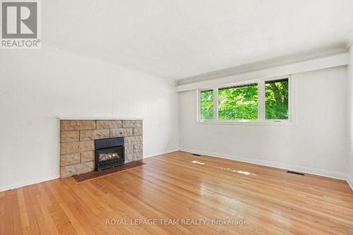 3 Donna Street, Ottawa, ON - Indoor Photo Showing Living Room With Fireplace