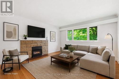 3 Donna Street, Ottawa, ON - Indoor Photo Showing Living Room With Fireplace