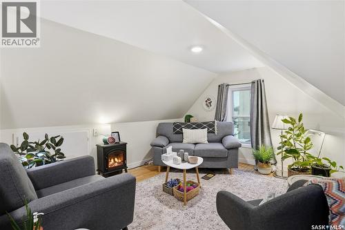 3130 13Th Avenue, Regina, SK - Indoor Photo Showing Living Room With Fireplace