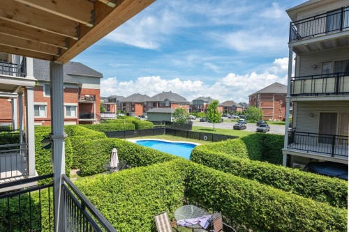 Vue - 3-4595 Ch. Des Prairies, Brossard, QC - Outdoor With In Ground Pool