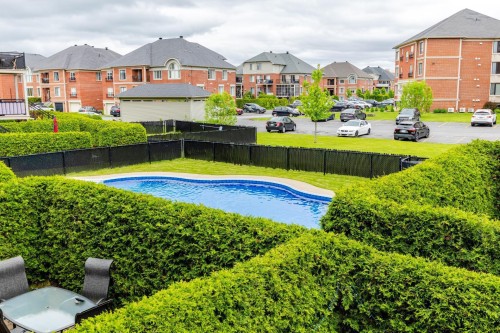 Jardin - 3-4595 Ch. Des Prairies, Brossard, QC - Outdoor With In Ground Pool