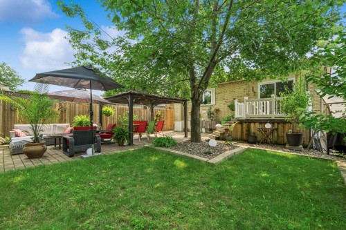 Cour - 625 Rue De Briançon, Laval (Laval-Des-Rapides), QC - Outdoor With Deck Patio Veranda With Backyard