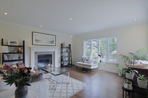 Salle familiale - 323 Rue James-Shaw, Beaconsfield, QC - Indoor Photo Showing Living Room With Fireplace