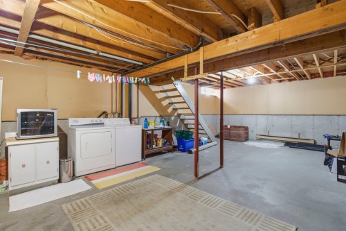 Sous-sol - 33 Av. Portway, Pointe-Claire, QC - Indoor Photo Showing Laundry Room