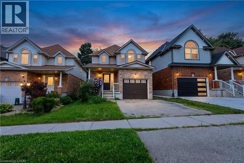 Brick and siding exterior with gabled roof lines - 248 Bridlewreath Street, Kitchener, ON - Outdoor With Facade