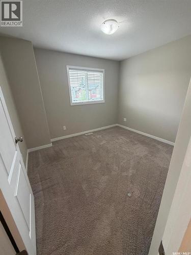 604 3440 Avonhurst Drive, Regina, SK - Indoor Photo Showing Other Room