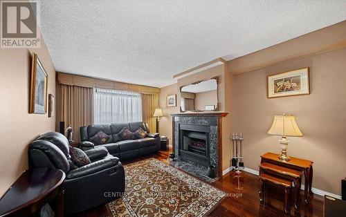 915 Catskill Drive E, Oshawa, ON - Indoor Photo Showing Living Room With Fireplace