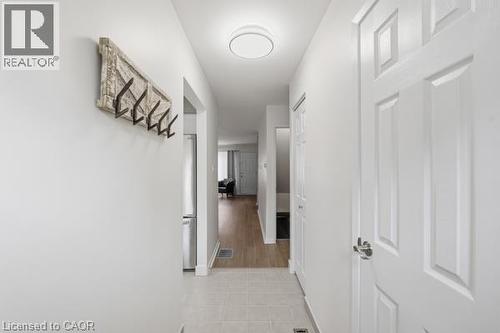 Entryway with light-toned tile flooring, recessed lighting, and white paneled doors - 15 Green Valley Drive Unit# 41, Kitchener, ON - Indoor Photo Showing Other Room