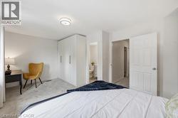 Neutral-toned walls complement a carpeted floor - 
