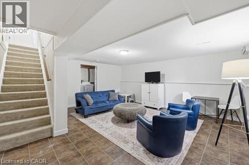 Carpeted staircase with wood handrail - 15 Green Valley Drive Unit# 41, Kitchener, ON - Indoor
