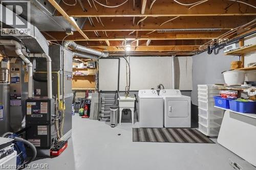 Utility area with a laundry sink - 15 Green Valley Drive Unit# 41, Kitchener, ON - Indoor Photo Showing Laundry Room