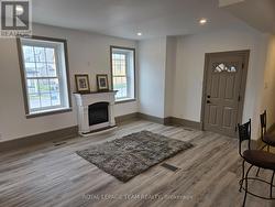 Apt 1 spacious livrm with electric fireplace - 