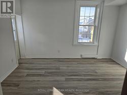 Apt. 2 Primary bedroom with emergency exit - 