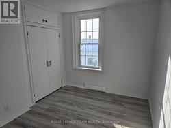 Apt. 2, 2nd bedrm showcasing more storage - 